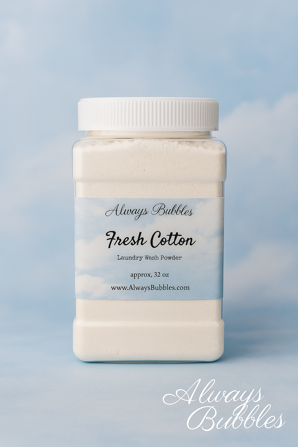 A square 32 oz jar of Always Bubbles Fresh Cotton Laundry Wash Powder displayed against a soft sky-inspired background, styled to match the clean cotton scent