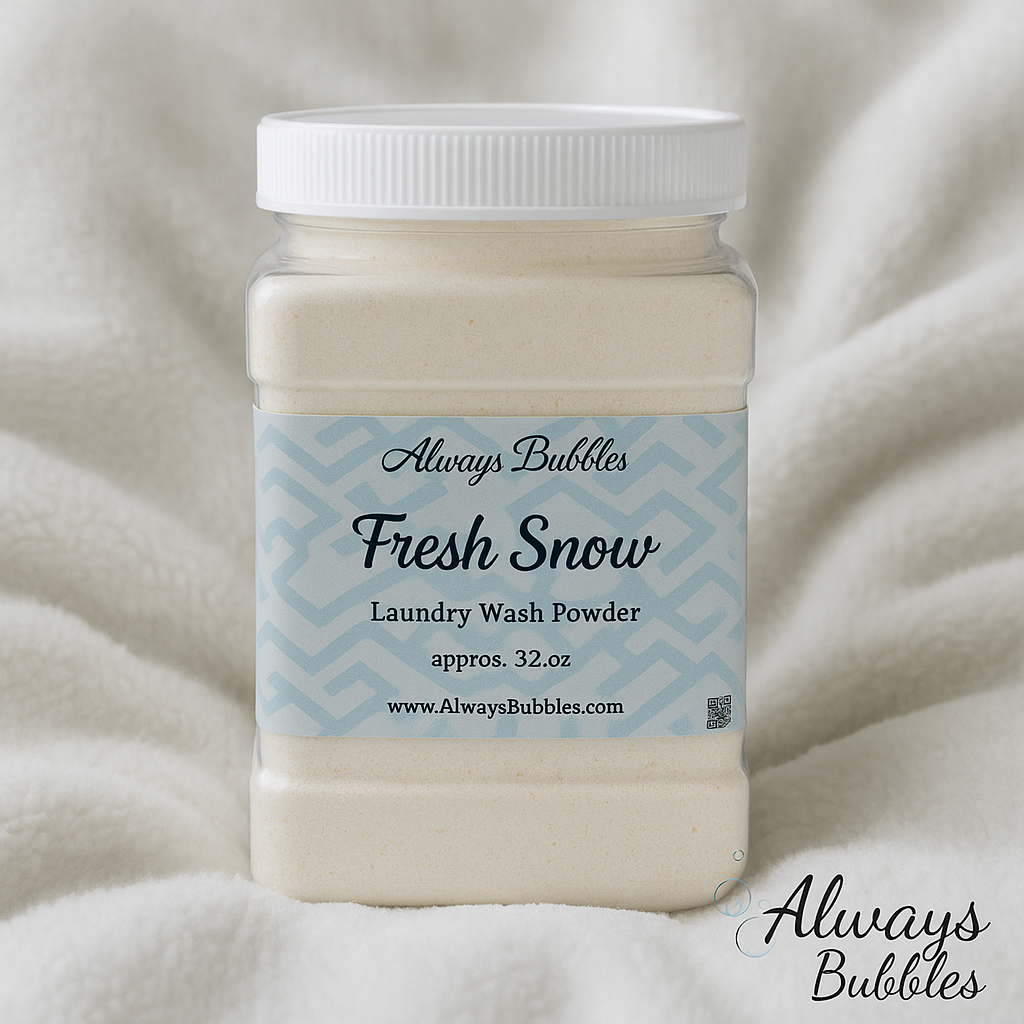 Always Bubbles Fresh Snow Laundry Wash Powder 32 oz – clean winter laundry detergent with natural oxy booster on cozy white blanket background.