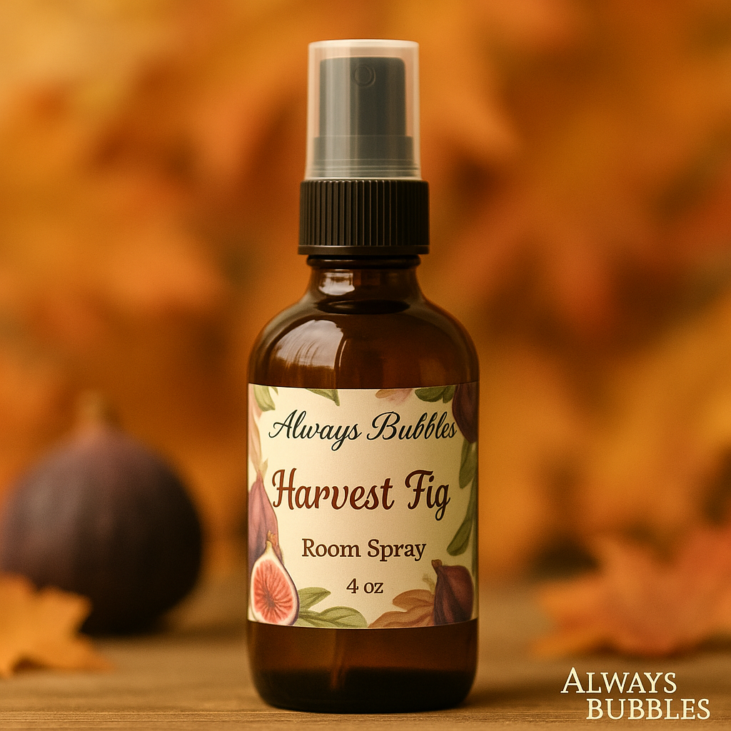 Always Bubbles Harvest Fig Room Spray – warm fall home fragrance with rich fig, amber, and wood notes in an amber glass bottle surrounded by autumn leaves.