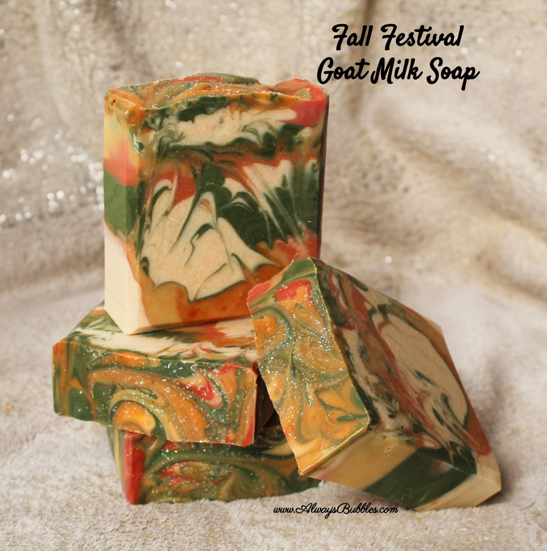 Fall Festival Goat Milk Soap by Always Bubbles — handmade goat milk soap with swirls of orange, green, red, and cream, topped with a touch of sparkle. Autumn-inspired fragrance, crafted with Shea butter and natural oils for fall skincare.
