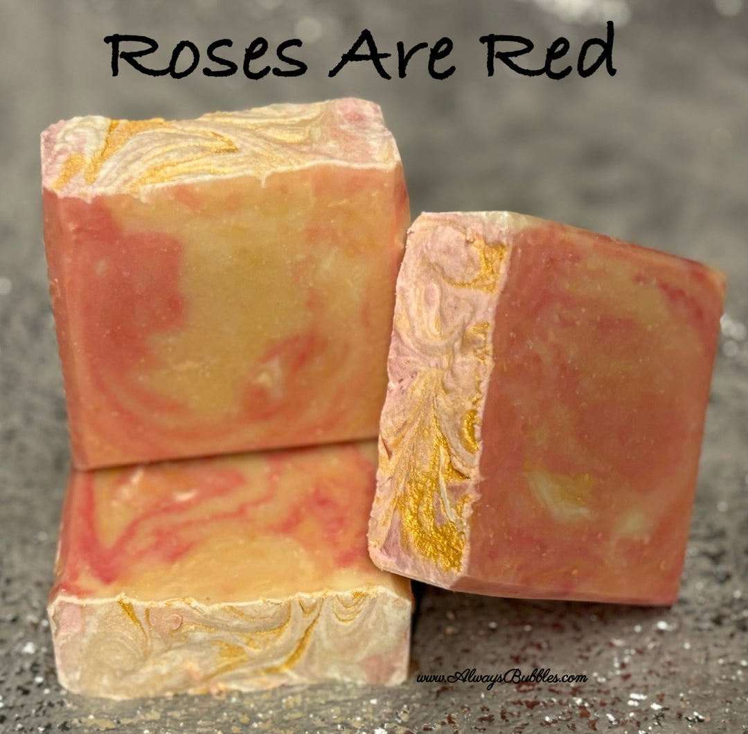 Handcrafted Roses Are Red Goat Milk Soap bar with swirls of pink, cream, and gold – romantic rose-scented soap by Always Bubbles.