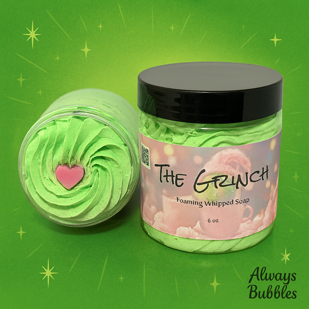 Bright green “The Grinch” foaming whipped soap with pink heart piping in jar — Always Bubbles holiday collection